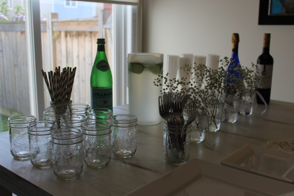 Set up a drink bar for people to help themselves - include paper straws, champagne, wine, lemonaid, cucumber water, and something sparkling so everyone has something they'll like. 