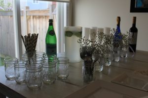 Set up a drink bar for people to help themselves - include paper straws, champagne, wine, lemonaid, cucumber water, and something sparkling so everyone has something they'll like.