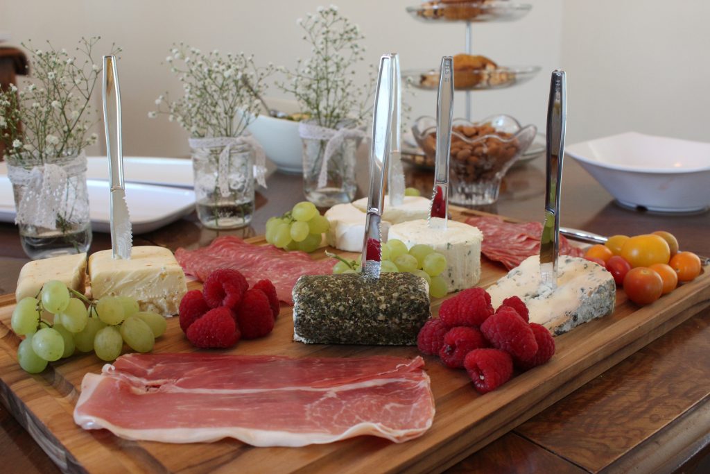 A Charcuterie Board is the perfect food offering for a shower - combine meats and cheese so there's a little something for everyone! Serve a variety of finger foods so that guests of the bridal shower can snack and chat throughout the afternoon. 