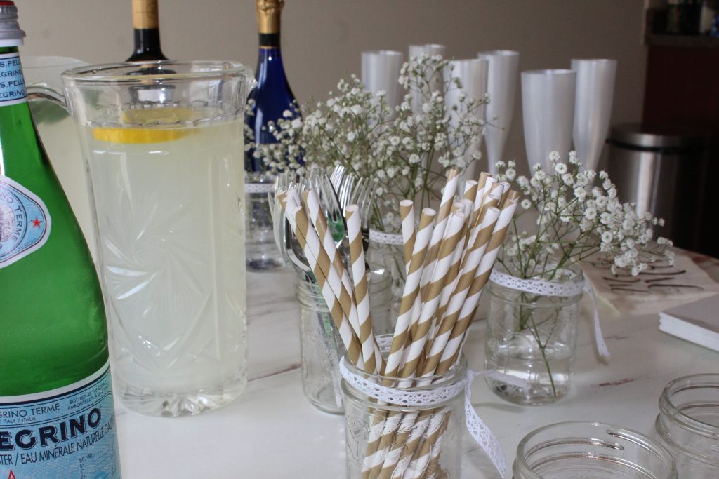 Set up a drink bar for people to help themselves - include paper straws, champagne, wine, lemonaid, cucumber water, and something sparkling so everyone has something they'll like. 